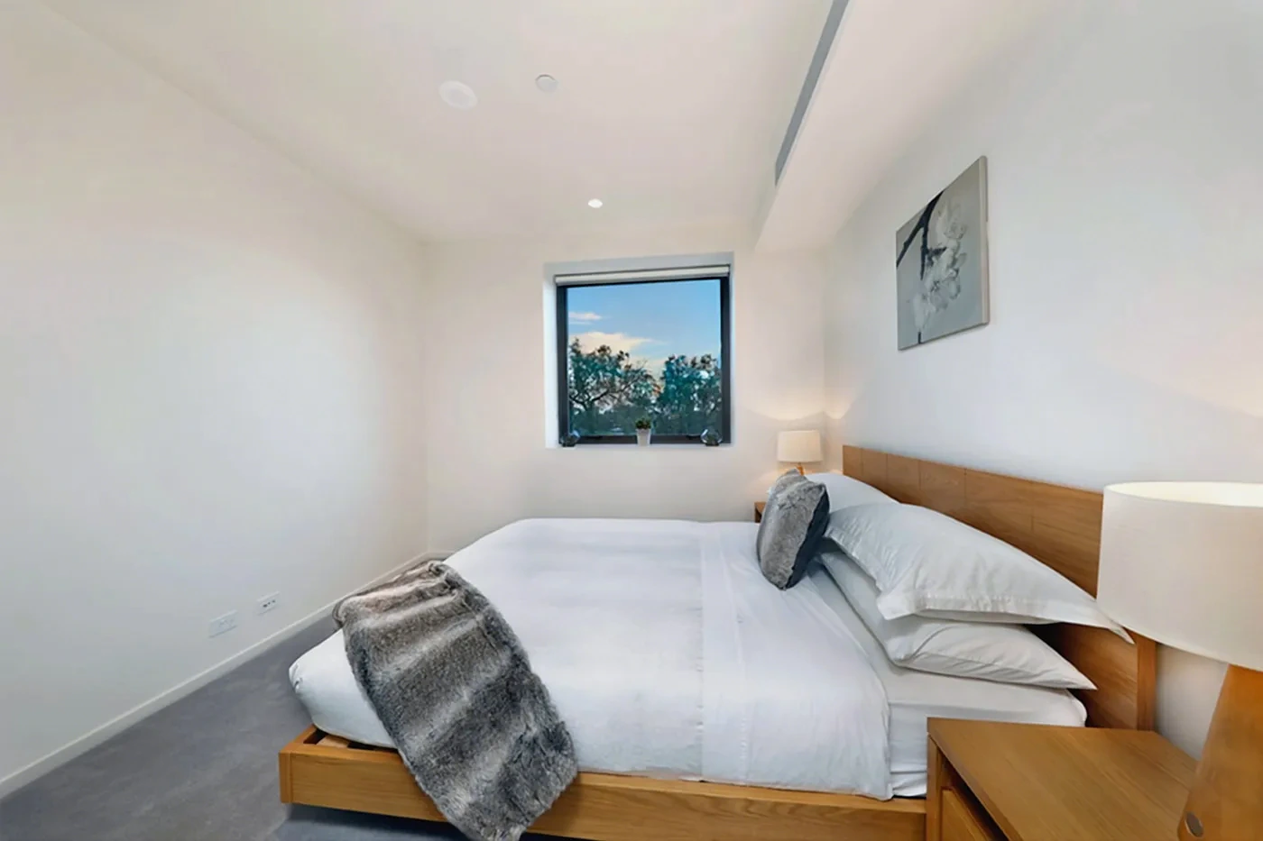 Furnished master bedroom with premium linen in the Armadale residence