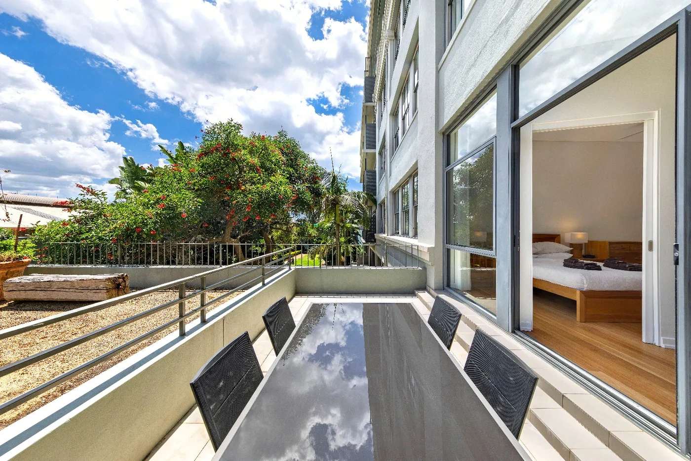 Balcony with a leafy harbour outlook at a Westprecinct serviced residence in Balmain