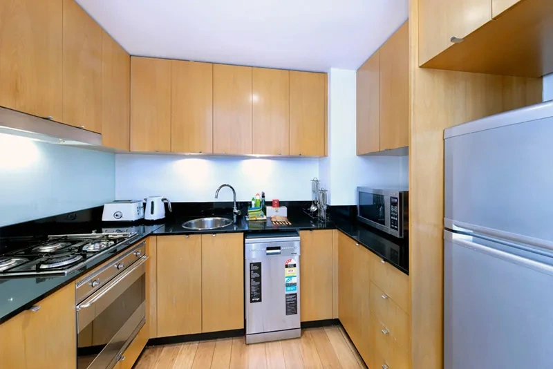 Fully equipped kitchen with stone benchtops and stainless appliances, Balmain