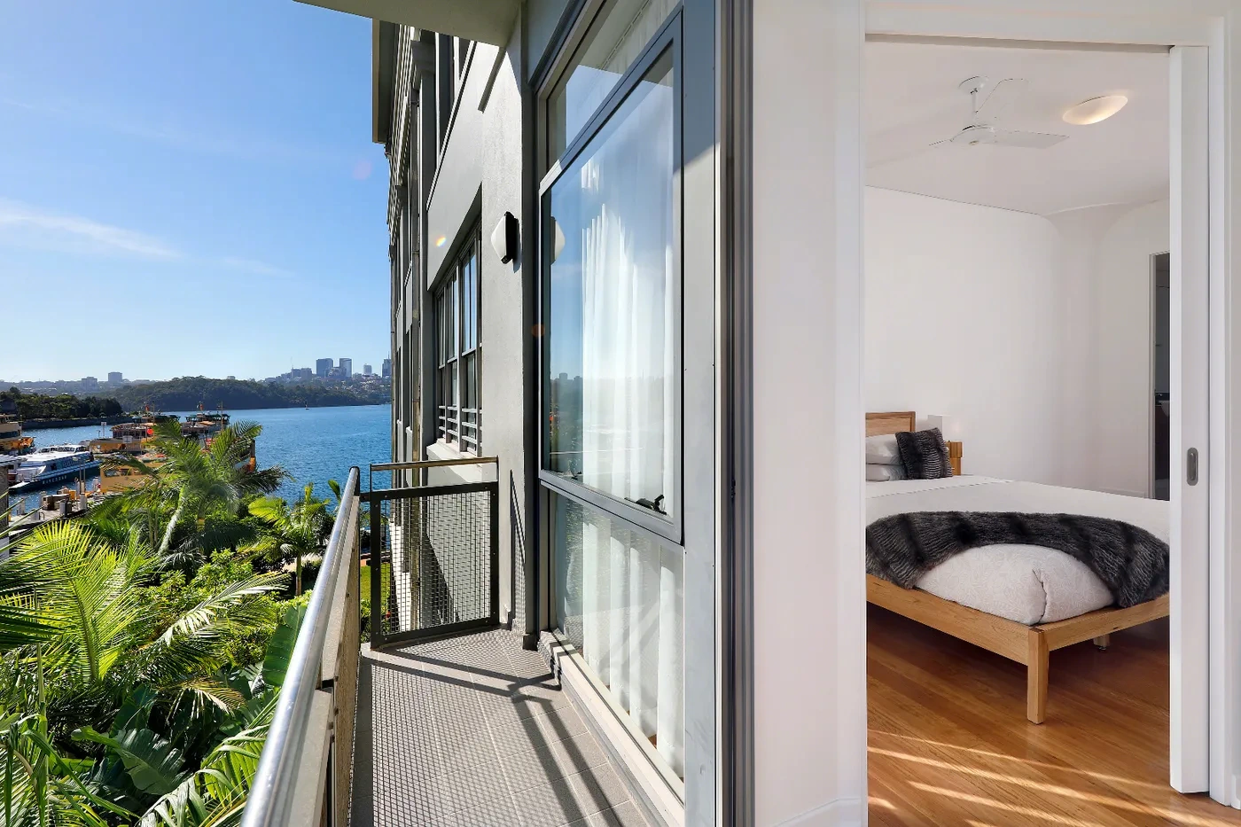 Balcony with Sydney Harbour views over Mort Bay at The Peninsula, Balmain