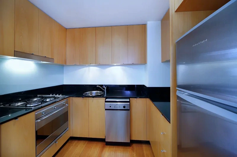 Fully equipped kitchen with stone benchtops and stainless appliances, Balmain