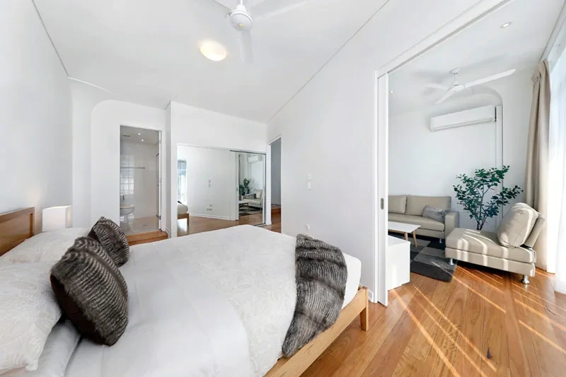 Master bedroom with timber floors and ensuite, Balmain residence
