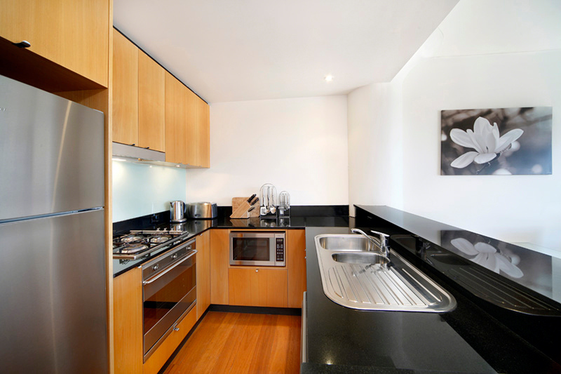 Furnished master bedroom in the high-floor Balmain residence