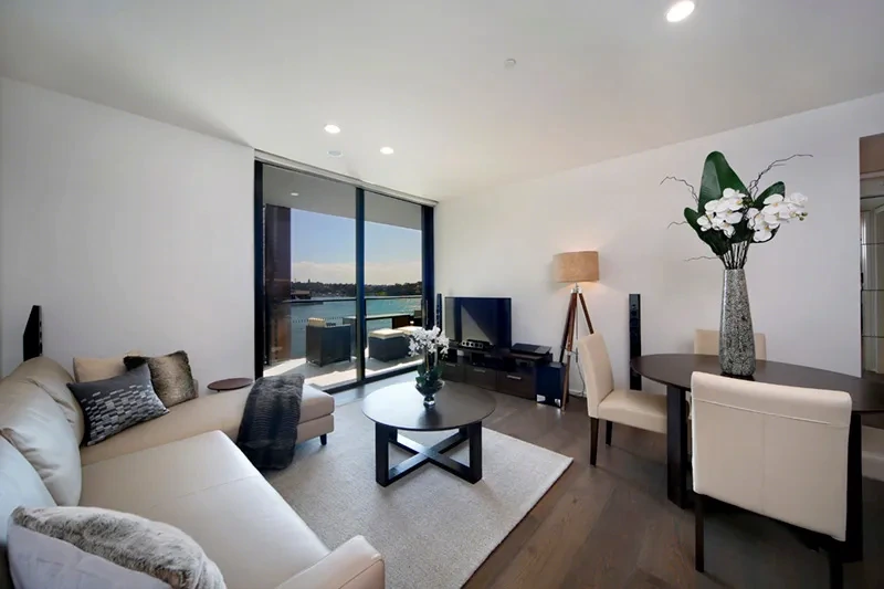 Open-plan living area with harbour outlook