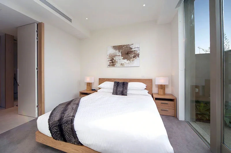 Lavish master bedroom opening to the garden
