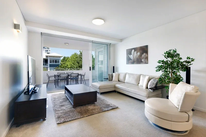 Light-filled open-plan living room in the high-floor Signature Residence