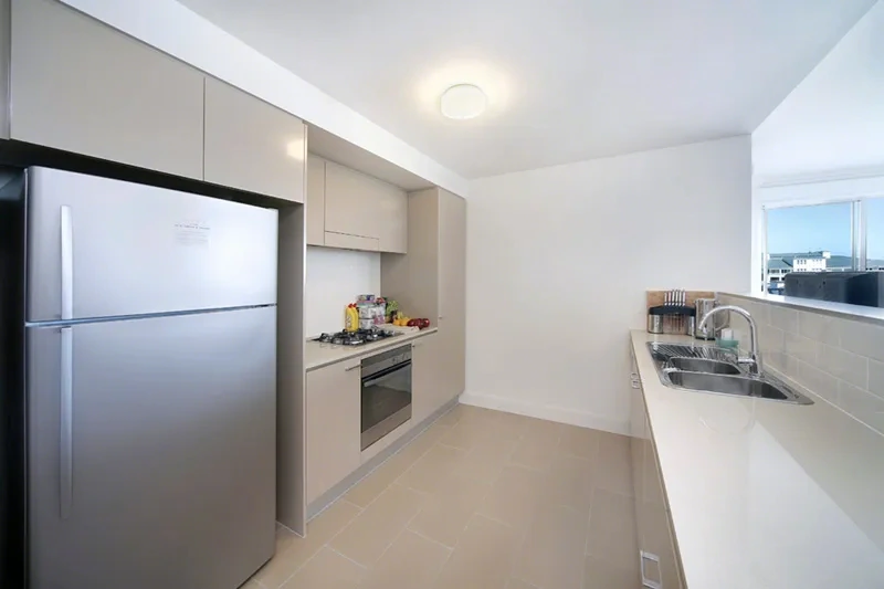 Chef-styled granite kitchen in the sub-penthouse