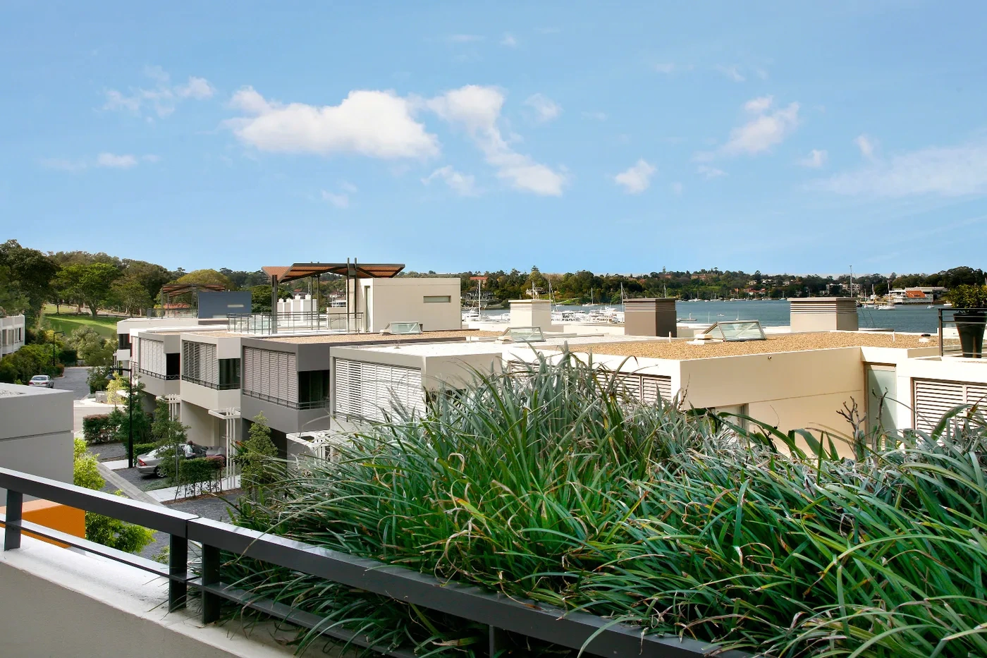 Leafy outlook over gardens and the river from a Westprecinct serviced residence in Cabarita