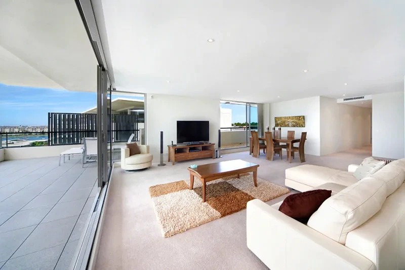 Living area opening onto the wrap-around terrace