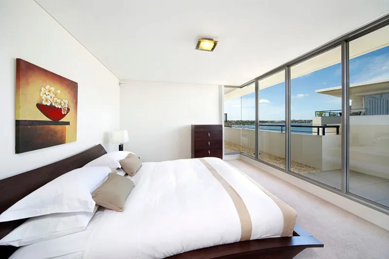 Furnished master bedroom in the top-floor residence
