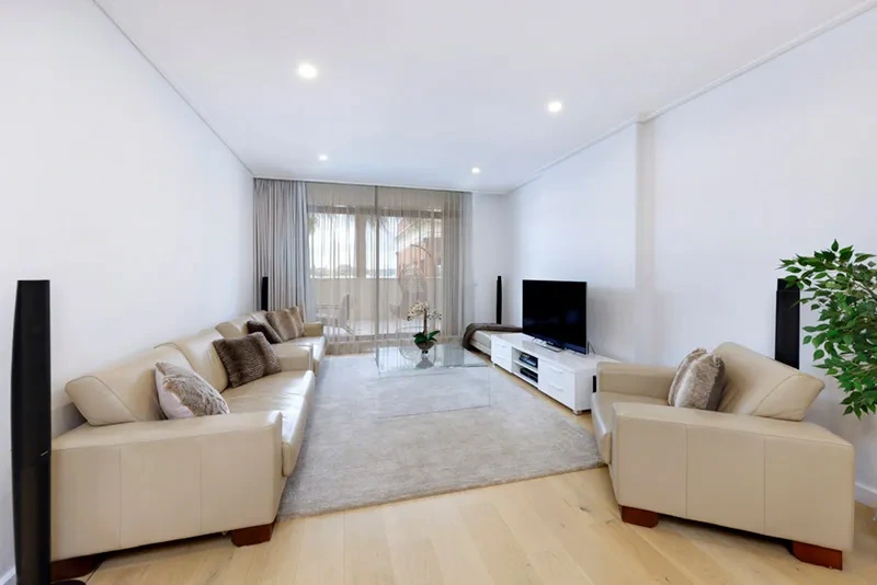 Fresh, modern furnished living area with terrace access