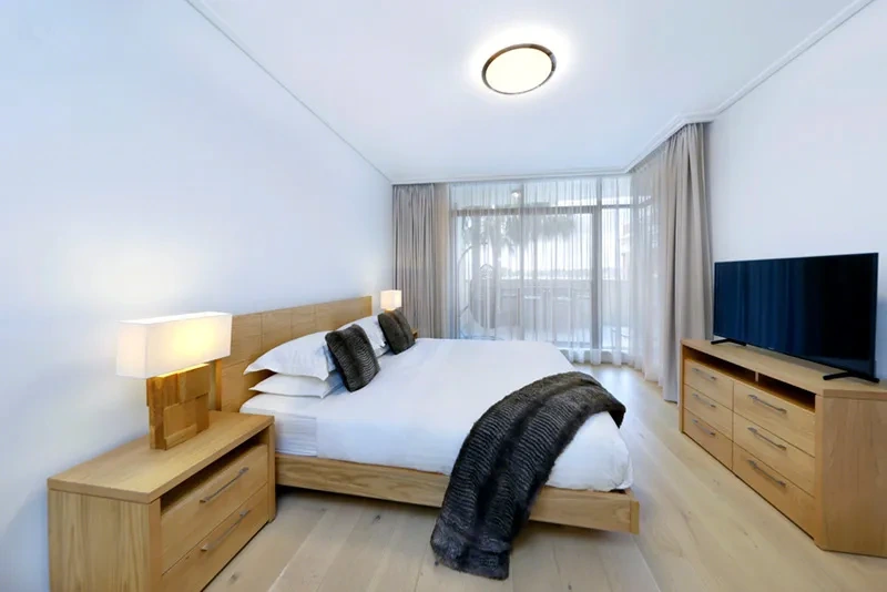 Furnished master bedroom appointed to The Westprecinct Standard
