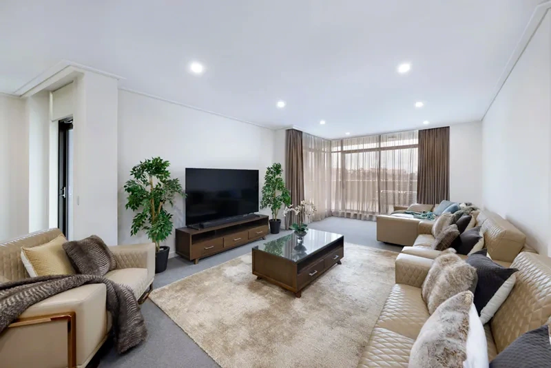 Generous open-plan living area furnished to The Westprecinct Standard