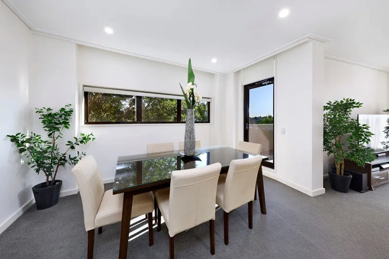 Open-plan dining area with garden outlook