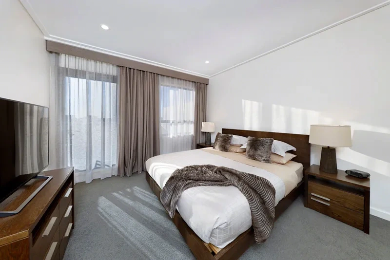 Furnished master bedroom appointed to The Westprecinct Standard