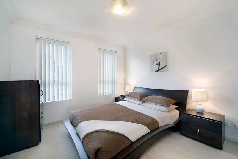 Luxurious master bedroom in the Rozelle waterfront penthouse