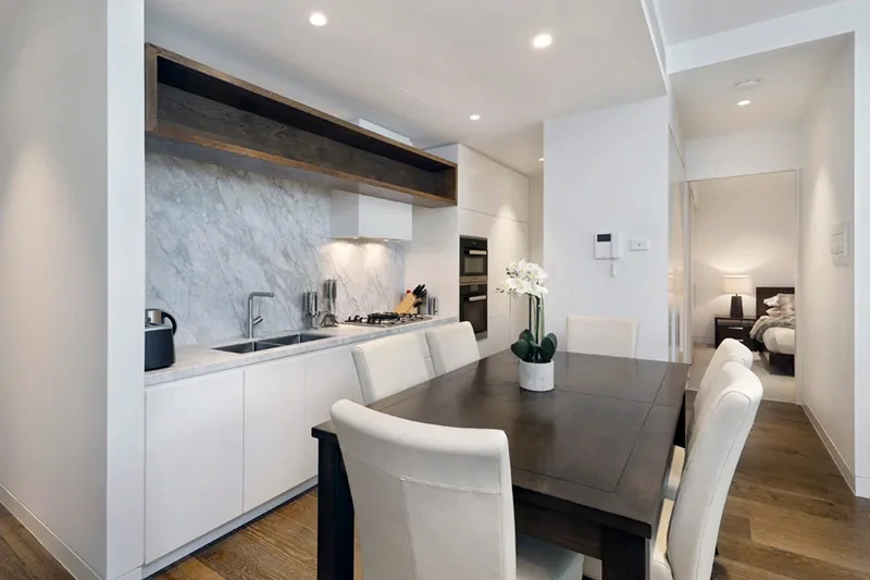 Furnished kitchen and dining appointed to The Westprecinct Standard