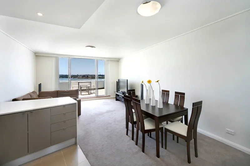 Furnished living and dining area at the Wentworth Point residence